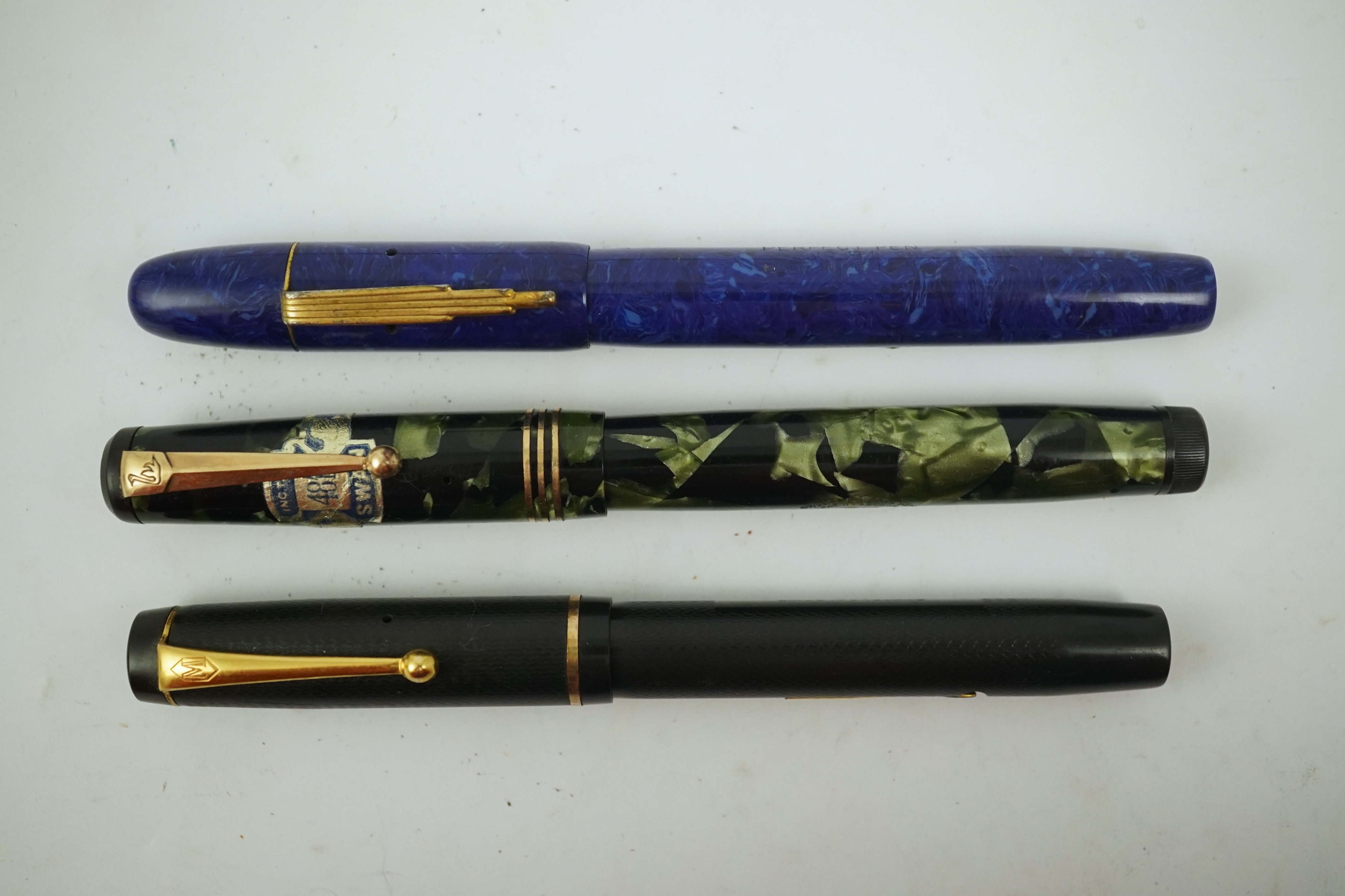 A Wyvern Perfect, No. 81, a Mentmore Autoflow fountain pen and a Mabie Todd Swan fountain pen. Condition - fair to good